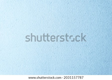 Blank clean pale blue color or light blue cool tone on eco friendly cardboard board box recycled paper background or backdrop for decoration