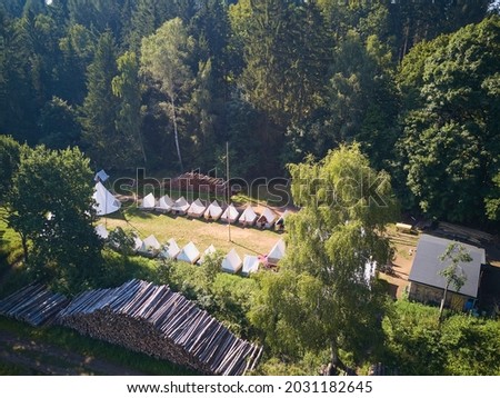 Scout camp with tents and teepee (tipi or tepee). View from above