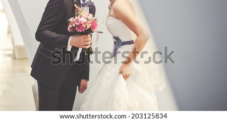 Stylish newlywed caucasian couple together. Wedding day.
