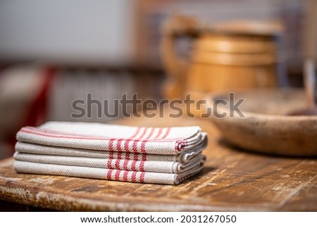 picture of traditional linen towels on the wooden table