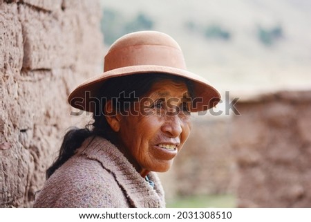 Native american old woman in the countryside.