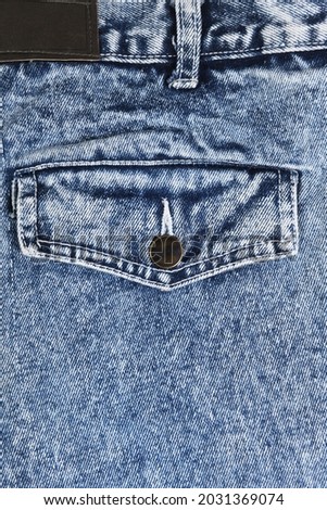 Close-up pocket of blue vintage jeans 90s.1990s.