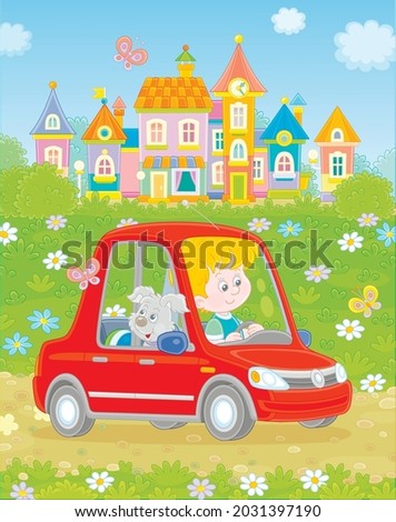 Smiling little boy with his pup driving a toy car on a road out of a pretty small town on a summer day, vector cartoon illustration