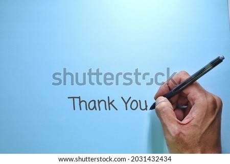 Note with words Thank you for blue background. Thank You text words typography, Business Concept, Motivational concept. Marketing and Communications Concept. Art Concept