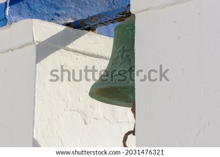 close-up image from a church bell tower in the Cyclades
