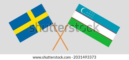 Crossed flags of Sweden and Uzbekistan. Official colors. Correct proportion