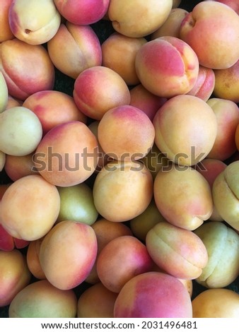 Background of fresh apricot.
Apricot close-up for healthy eating. Ripe apricots fruit pattern.