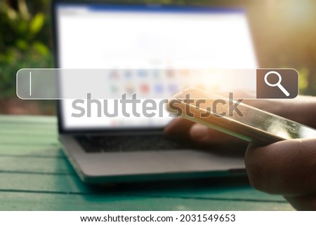 Hand man using laptop and Searching browsing data on the Internet online.network,media, keyword,Digital Web,Photo concept Searching information of and Technology.