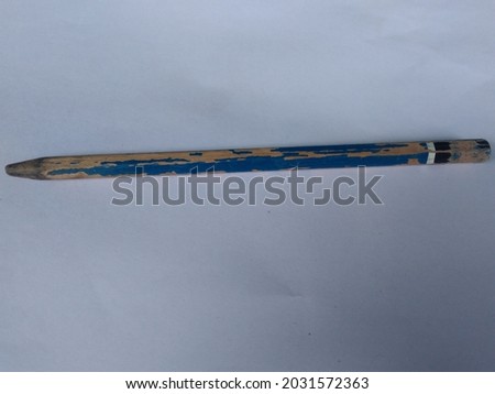 old blue pencil with the white background