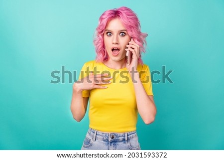 Photo of millennial looking pink hairdo lady talk telephone wear yellow t-shirt isolated on teal background