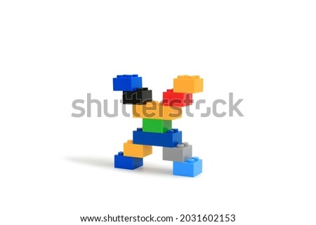 Alphabet letters X from colorful plastic brick block constructor isolated on white background. Image with Clipping path