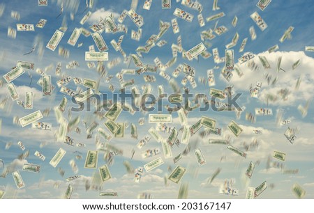 dollar note falling down over blue sky
