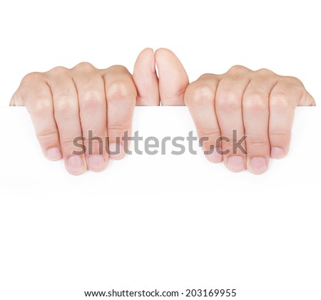 Man's hands holding a white sheet of paper