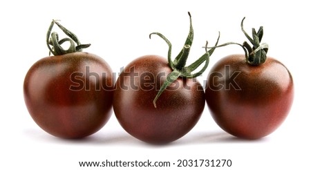 Tomatoes cherri cumato close-up isolated on a white background. Black tomato. Royalty-Free Stock Photo #2031731270