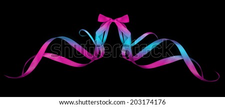 colorful gift bows with ribbons on a black background