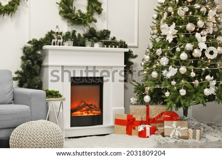 Fireplace decorated for Christmas in living room