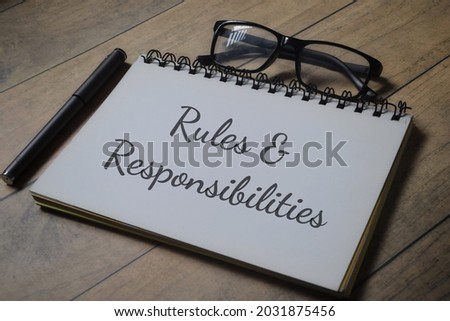 Top view of book with Rules and Responsibilities wording