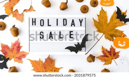 Lightbox with text HOLIDAY SALE, Halloween autumn leaves decorations Sale shopping concept. Online shopping Template Black friday sale mockup fall thanksgiving promotion advertising Big sale. Cyber