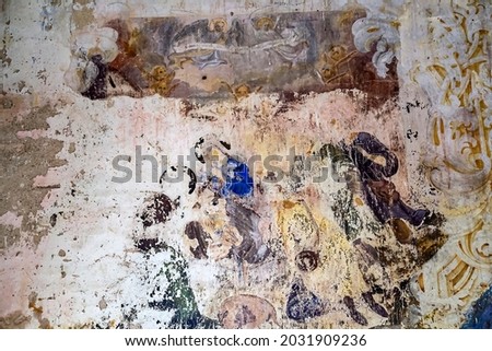illustrations from the Bible on the wall of an abandoned church, the village of Nikitskoye, Kostroma province, Russia. The year of construction is 1789. Currently, the temple is abandoned.