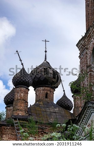 domes of an old abandoned church, the village of Sukhorukovo, Kostroma province, Russia. The building was built at the end of the 18th century. Currently, the temple is abandoned.