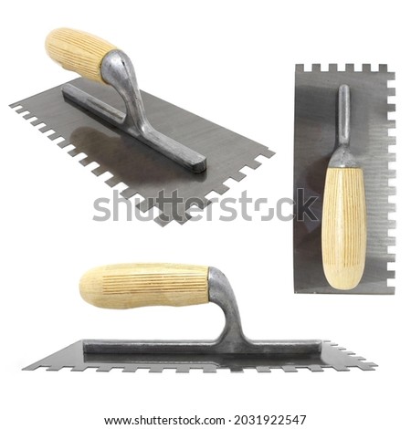 Metallic Trowel for Plastering and mix or cement work isolated on white background with clipping paths Royalty-Free Stock Photo #2031922547