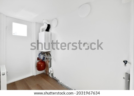 Boiler room with a heating system in a private house. High quality photo