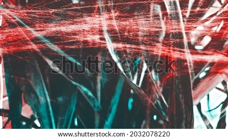 Grass in cobweb background for halloween celebration. Corn leaves close up with orange spider webs. Halloween concept copy space for text