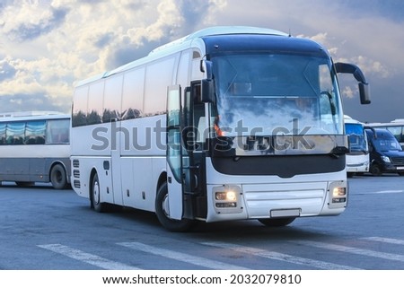 big tourist buses on parking Royalty-Free Stock Photo #2032079810