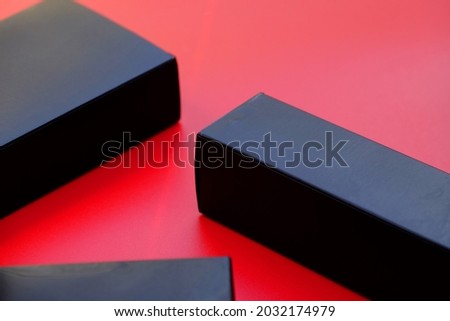 Black box on red background