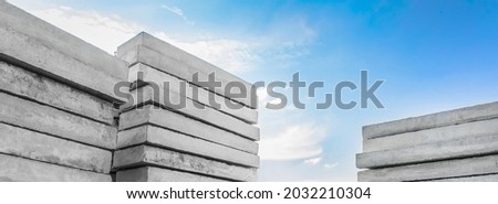 Concrete blocks at a construction site. Concrete structures, industrial, building materials, high resolution. Royalty-Free Stock Photo #2032210304