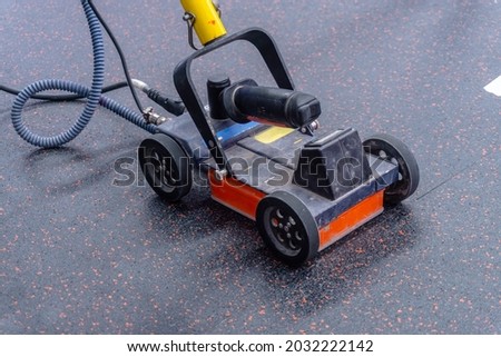 concrete scaning equipment , Ground Penetrating Radar , for investigation reabr , or something inside concrete floor  Royalty-Free Stock Photo #2032222142
