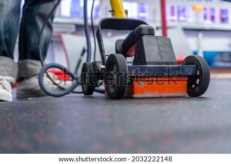 concrete scaning equipment , Ground Penetrating Radar , for investigation reabr , or something inside concrete floor  Royalty-Free Stock Photo #2032222148
