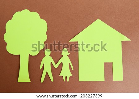 Paper family on brown background