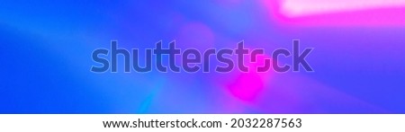Ray light of pink and purple color. Colorful vibrant blurred shine abstract background. Defocused bright light. Elegant Fluid neon Ultraviolet light abstract template. Bokeh defocused lights Royalty-Free Stock Photo #2032287563