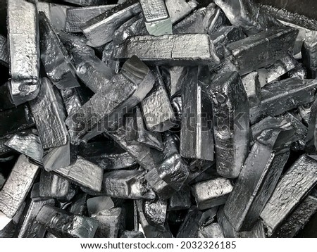 Aluminiums alloy scrap of casting automotive parts in scrap bucket Royalty-Free Stock Photo #2032326185