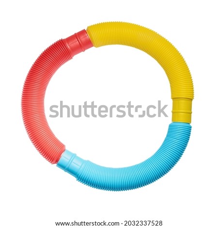 Close up of Poptube toy plastic isolated on white background with clipping path. Rainbow Hues colors. fidget push pop anti-stress sensory toy. Autism Special