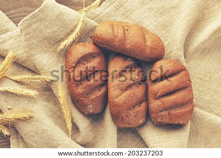 Linen cloth with bread loaves on it