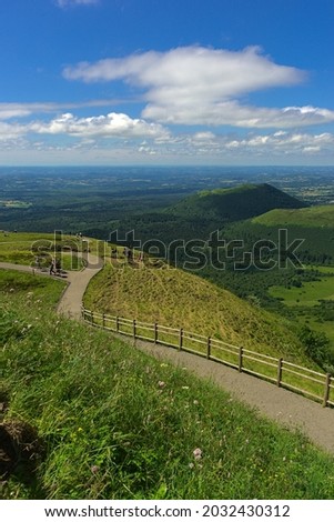 View of the Puys chain in Auvergne, panoramic of the Domes. Puy de Dome Royalty-Free Stock Photo #2032430312