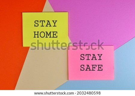 stay home, stay safe during an outbreak of the COVID-19 virus. Virus Pandemic Protection Concept. stay home, stay safe text words typography. Flat lay. Quarantine measures for Covid-19, multicolor 