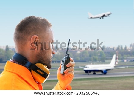 Aircraft Maintenance Staff And Airport Ground Crew Royalty-Free Stock Photo #2032605947