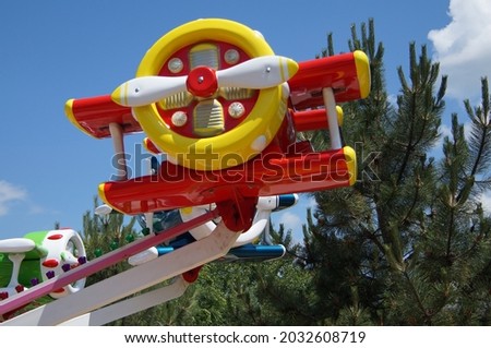 bright red toy airplane carousel