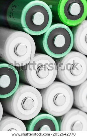AA batteries as a texture background in full screen. The concept of energy supply and rational utilization