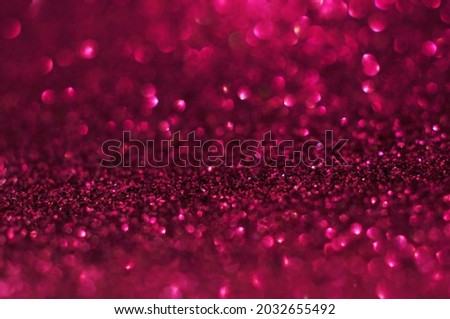 Abstract beautiful ruby ​​red bokeh glitter on blur background.