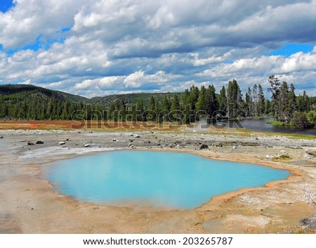 turquoise-colored black opal pool, biscuit geyser basin in yellowstone national park, wyoming