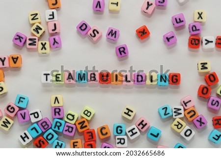 teambuilding word with alphabet cubes Royalty-Free Stock Photo #2032665686
