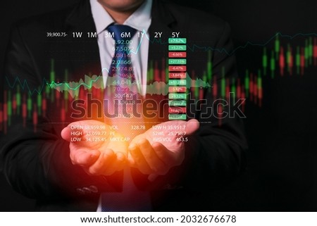 Businessman, Investment, Entrepreneur, Coin Trading, Bit Coin via Virtual Reality Screen. Stock market data and trading charts are popular.
