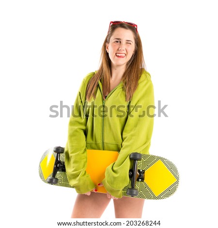 Blonde girl with skate over white background