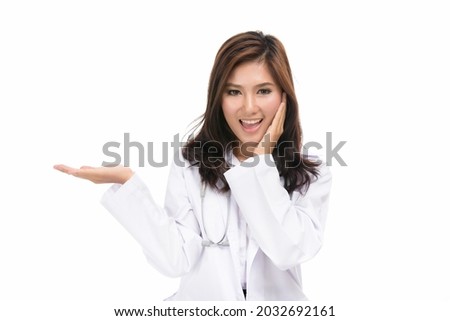 Happy young doctor Asian woman presenting product or showing empty copy space,concept positive emotions and facial expression,portrait of beautiful Asian woman,isolated on white background