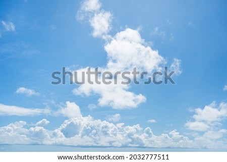 Natural Clouds in the blue sky on sunny day.Beautiful white cloud with blue sky background.Clear blue sky and white clouds for sunlight.Bright blue sky background with tiny clouds.