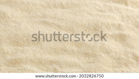 Close up of semolina flour background Royalty-Free Stock Photo #2032826750